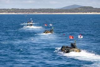 Republic of Korea Marine Corps Amphibious Assault Vehicles approach the beach from ROKS Marado during Exercise Talisman Sabre 23.