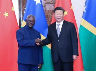 Solomon Islands’ Prime Minister Manasseh Sogavare meets with Chinese President Xi Jinping in Beijing, October 2019. 