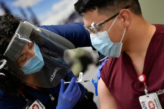 covid-19-vaccinating.jpg