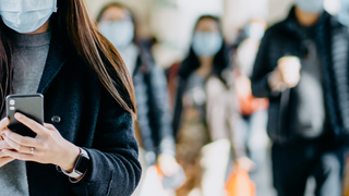 face-mask-smartphone-iphone-header-GettyImages-1203348066.png