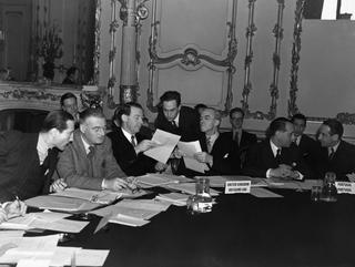 The British delegation of NATO’s Finance and Economic Committee discusses issues at a meeting in London in 1950