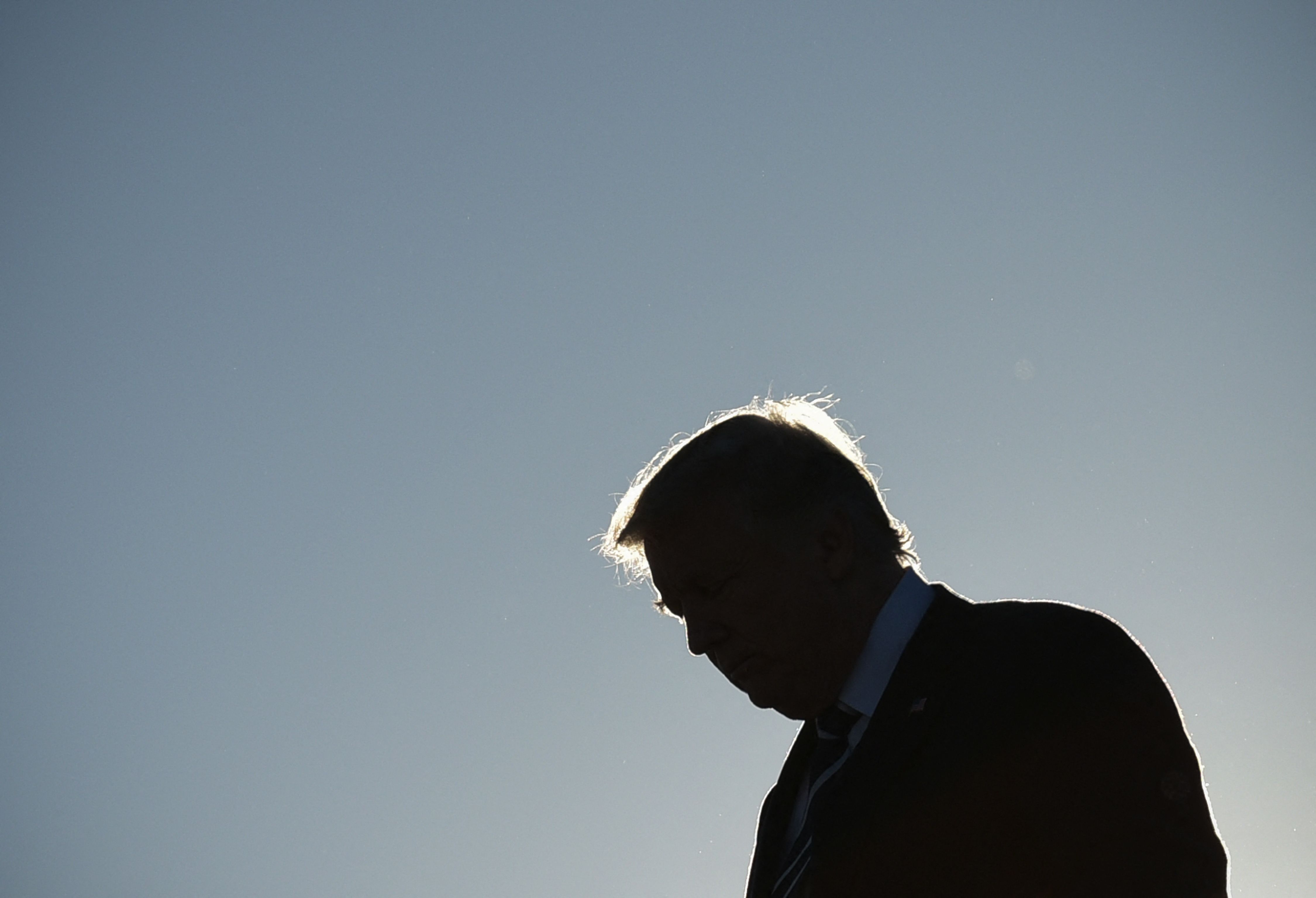 US President Donald Trump steps off Air Force One upon arrival at Greenville–Spartanburg International Airport in Greer, South Carolina, on October 16, 2017. Trump is in Greensville to attend a fundraiser for South Carolina Governor Henry McMaster.