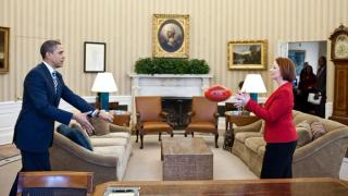 President Obama handballs an Australian rules football to Prime Minister Julia Gillard in the Oval Office, 2011