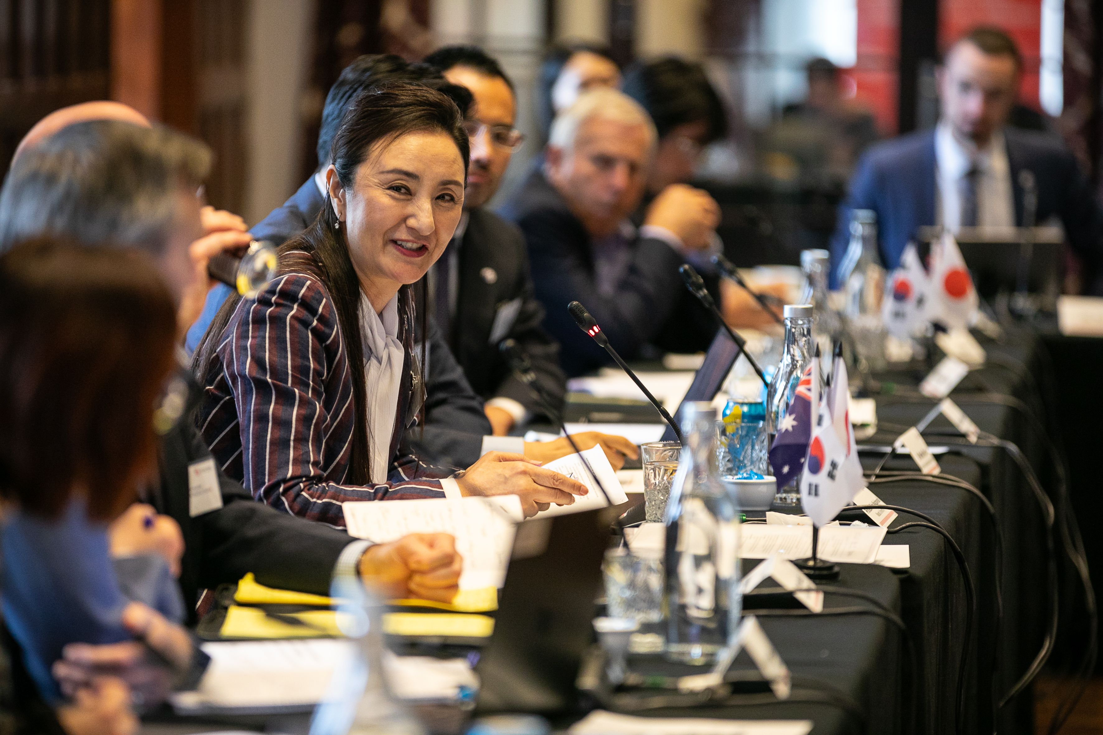 People talking at a track 1.5 dialogue on Australia-Korea-Japan relations
