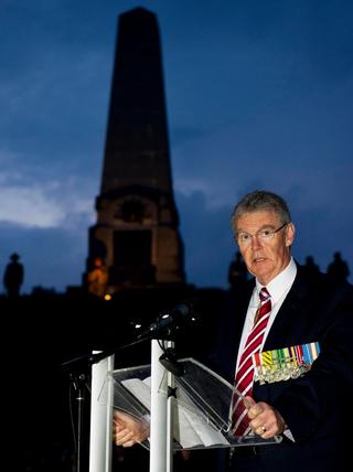 Duncan Lewis, Australian Ambassador to Belgium, Luxembourg, the European Union and NATO, addresses an Anzac Day dawn service in Belgium, 2014