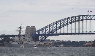 The USS Rafael Peralta, an Arleigh Burke-class destroyer in the US Navy, arrives into Sydney Harbour, 10 July 2021 (Getty)