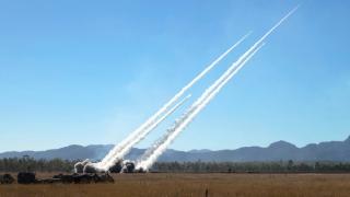 High Mobility Rocket Artillery Systems of the US Army and US Marine Corps launch rockets during a firepower demonstration at Shoalwater Bay Training Area during Talisman Sabre 2021