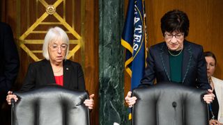 Chairwoman Sen. Patty Murray, D-Wash., left, and vice chair Sen. Susan Collins, R-Maine, take their seats before the start of the Senate Appropriations Committee hearing