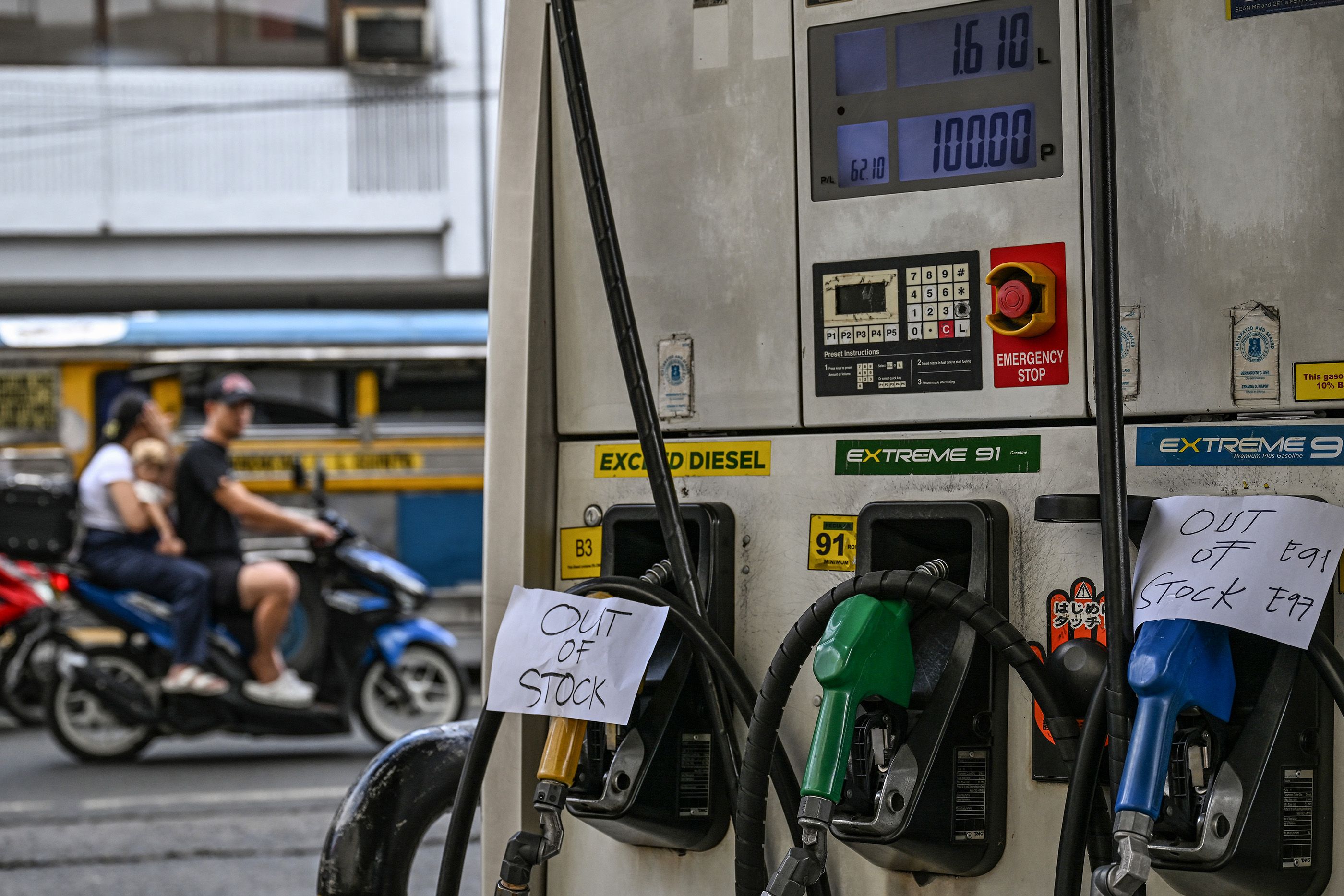 Signs reading 'out of stock' are displayed at a gas station amid rising petrol prices in Manila, March 2026.
