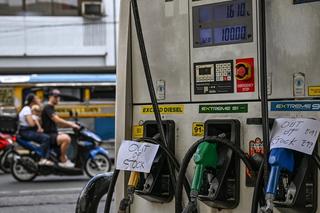 Signs reading 'out of stock' are displayed at a gas station amid rising petrol prices in Manila, March 2026.