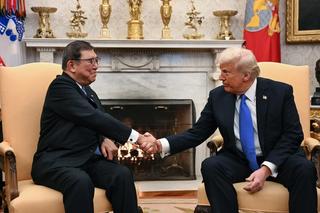 US President Donald Trump shakes hands with with Japanese Prime Minister Shigeru Ishiba in the Oval Office of the White House in Washington, DC
