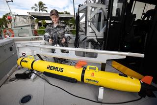 Able Seaman Hydrographic Systems Operator Chelsea Styan of Maritime Geospatial Warfare Unit conducts system checks on a Remus autonomous underwater vehicle at HMAS Cairns in 2022