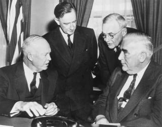 US President Eisenhower with Australian Ambassador to the United States, Percy Spender,US Secretary of State John Foster Dulles and Prime Minister Robert Menzies discussing the Suez crisis in 1958