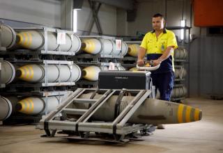 A storage and distribution manager from Thales moves explosive ordnance to the storage facility at Defence Establishment Orchard Hills.