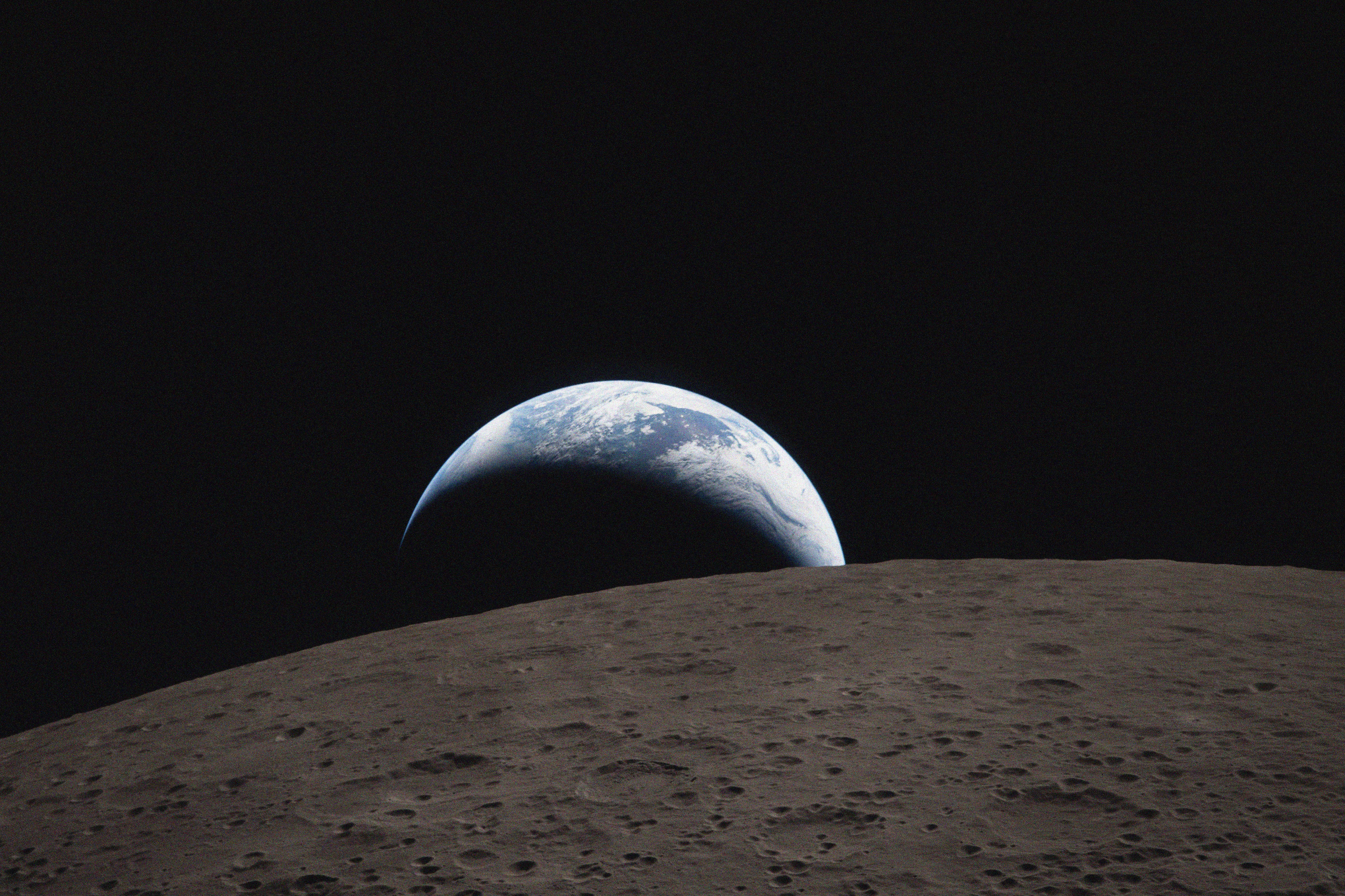 Earthset captured through the Orion spacecraft window on 6 April 2026, during the Artemis II crew’s flyby of the Moon.