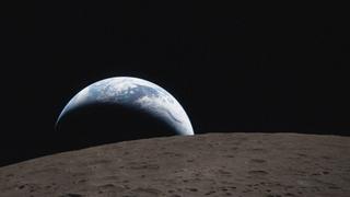 Earthset captured through the Orion spacecraft window on 6 April 2026, during the Artemis II crew’s flyby of the Moon.