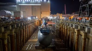 The Virginia-class submarine Iowa sits in a graving dock at the Electric Boat shipyard in Groton, Connecticut, August 2023.