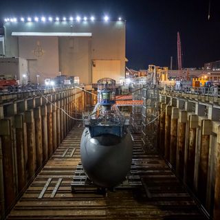 The Virginia-class submarine Iowa sits in a graving dock at the Electric Boat shipyard in Groton, Connecticut, August 2023.