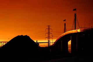 The Westgate Bridge over the Yarra River in the city of Melbourne Australia at sunset