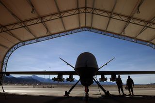 n MQ-9 Reaper remotely piloted aircraft (RPA) is prepared for a training mission at Creech Air Force Base on November 17, 2015 in Indian Springs, Nevada. The Pentagon has plans to expand combat air patrols flights by remotely piloted aircraft by as much as 50 percent over the next few years to meet an increased need for surveillance, reconnaissance and lethal airstrikes in more areas around the world.