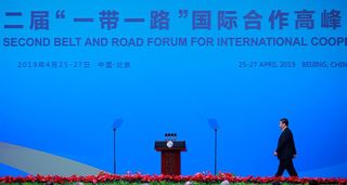 Chinese President Xi Jinping walks on stage to deliver his speech for the opening ceremony of the Belt and Road Forum for International Cooperation, April 2019