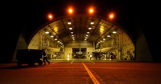 US airmen clear a hangar ahead of an operational readiness inspection at Misawa Air Base, Japan (September 2012)
