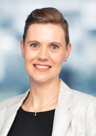 Dr Merriden Varrall