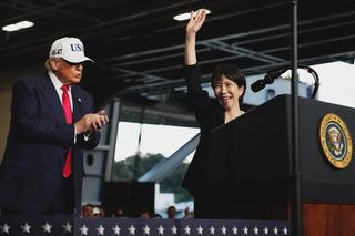 U.S. President Donald Trump applauds as Japanese Prime Minister Sanae Takaichi speaks to troops aboard USS George Washington at Fleet Activities Yokosuka on October 28, 2025 in Yokosuka, Japan. Trump is visiting Japan, fresh off an appearance at the ASEAN summit in Malaysia, and will next travel to South Korea for the APEC meetings.