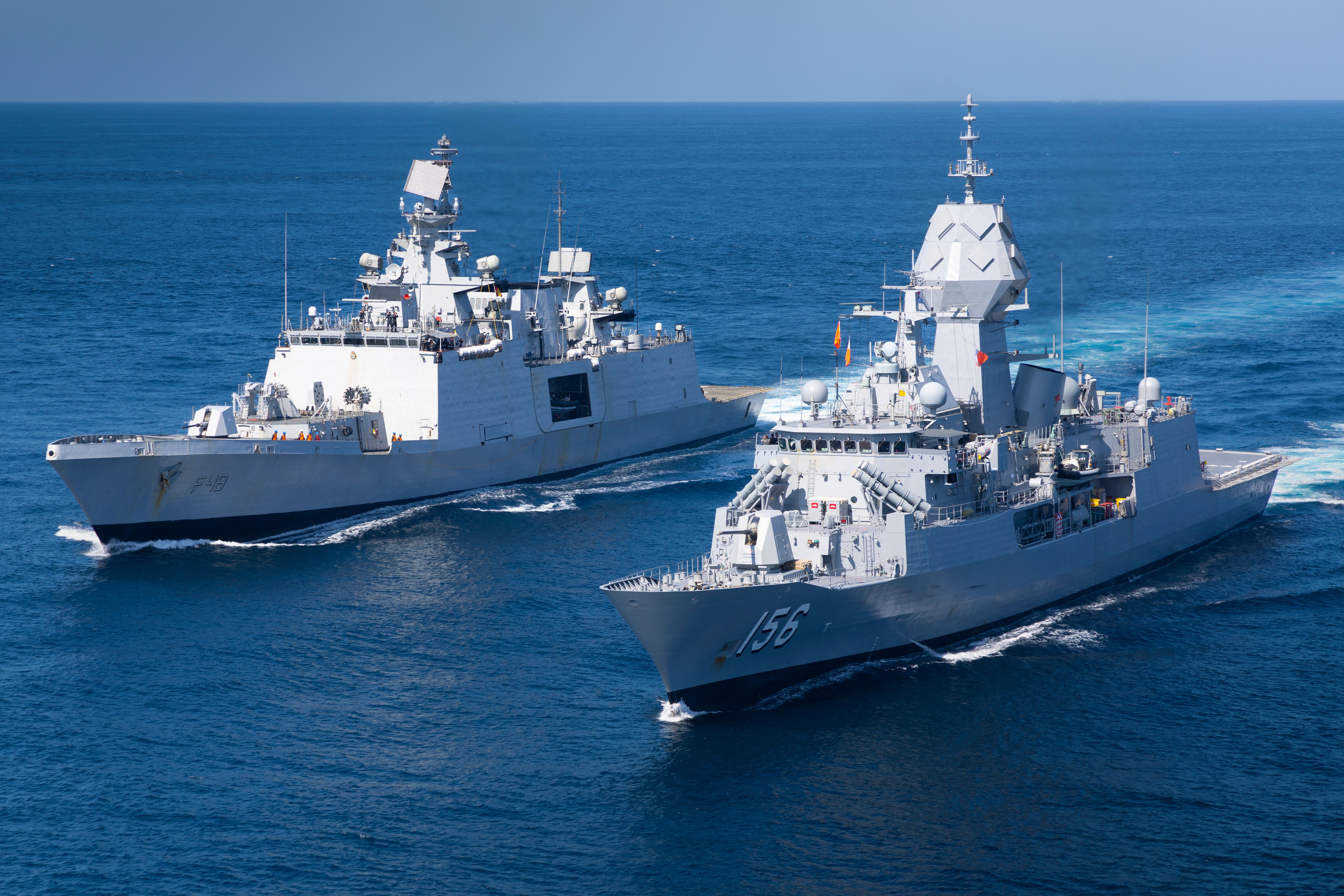 Indian Navy ship INS Sahyadri and HMAS Toowoomba conduct replenishment at sea approaches as part of a cooperative activity in the Timor Sea