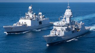 Indian Navy ship INS Sahyadri and HMAS Toowoomba conduct replenishment at sea approaches as part of a cooperative activity in the Timor Sea