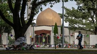 An armed police officer patrols the area outside the Al Noor mosque following the death of 49 worshippers who were shot by an Australian right-wing extremist in Christchurch, New Zealand, March 2019