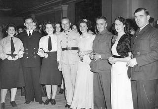 An ‘all services’ dance featuring US and Australian soldiers and ‘escorts’ at the Melbourne Town Hall during 1942