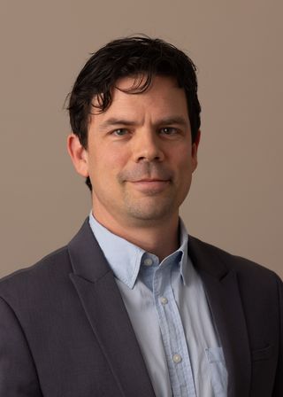 Rodney Taveira, a Senior Lecturer in American Studies