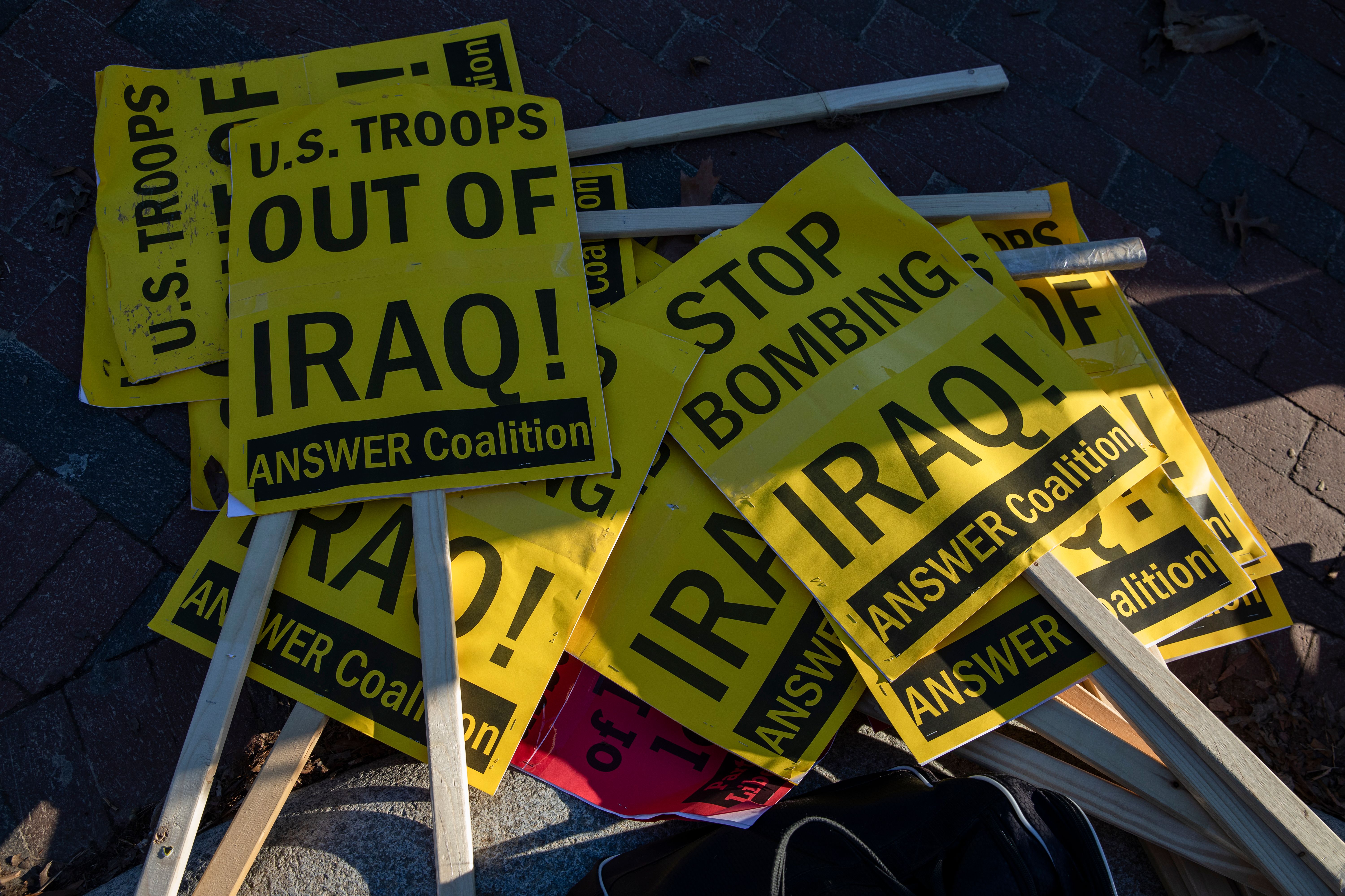 Spare signs are piled on the sidewalk outside of the White House on January 8, 2020 in Washington, DC.