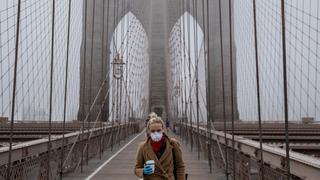 Brooklyn-Bridge-masked-woman-coronavirus-header-GettyImages-1207839451.png