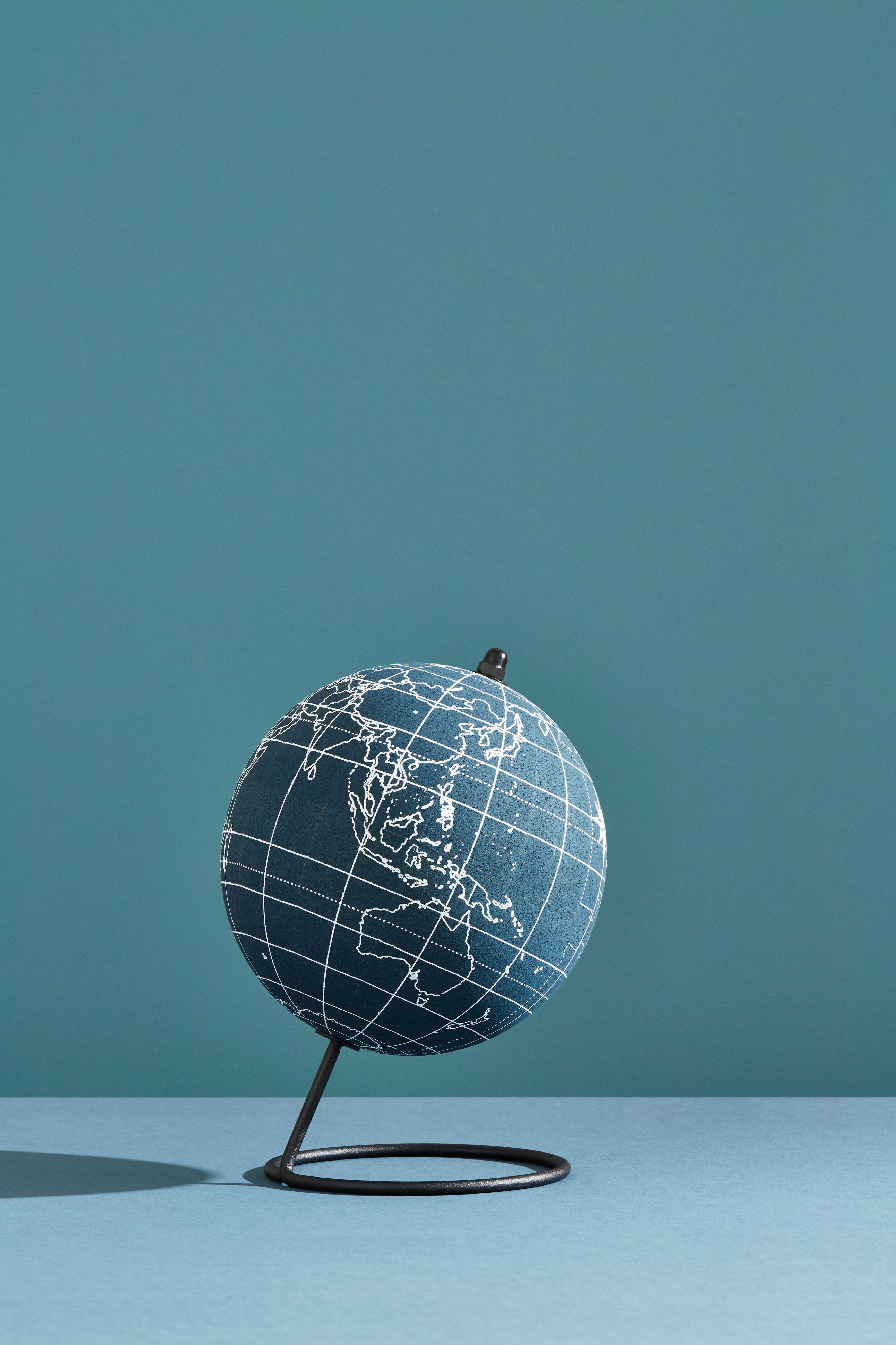 A world globe centred on East Asia and Australia