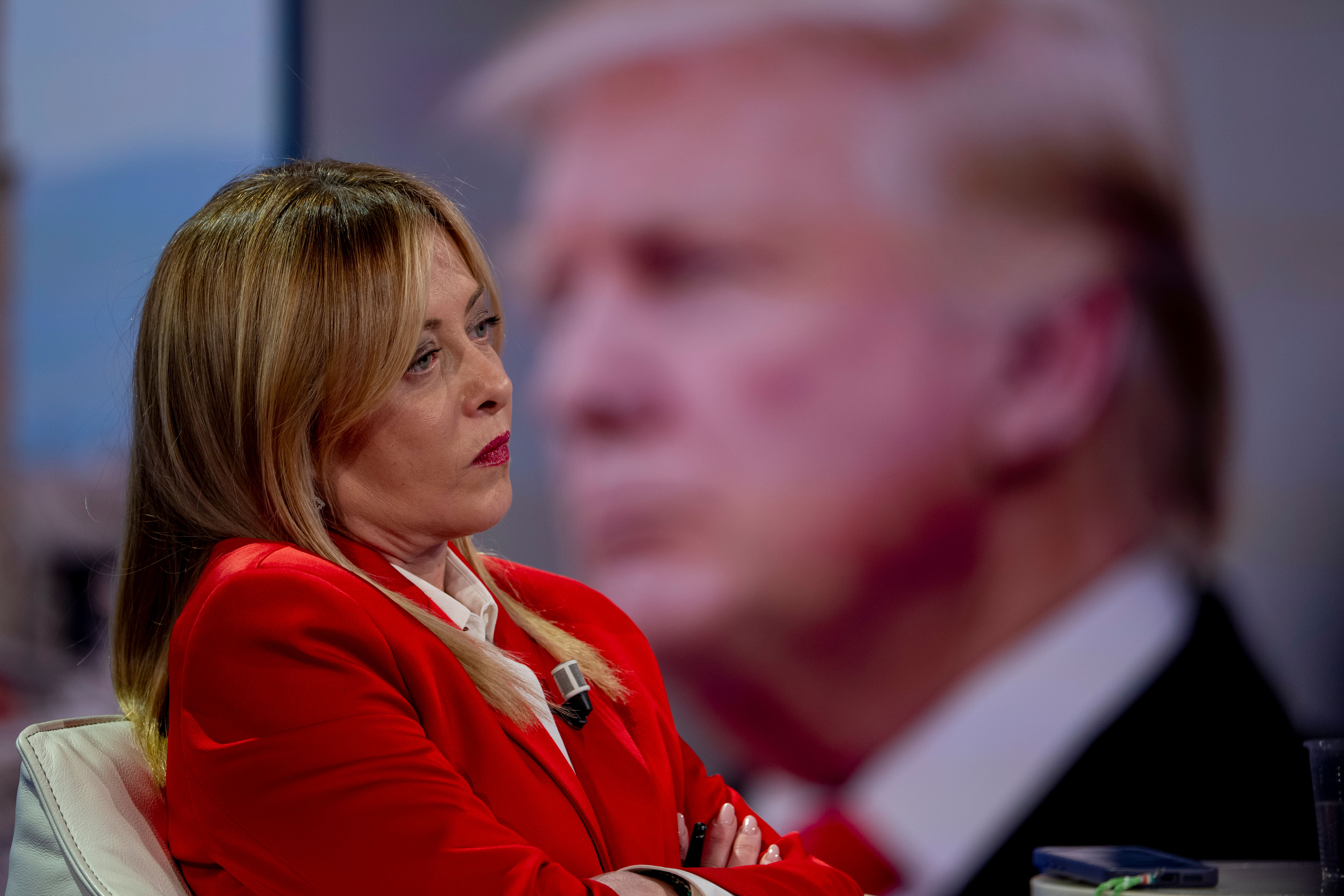 A photo of the U.S. President Donald Trump is displayed on the screen as Prime Minister of Italy Giorgia Meloni speaks on the "Porta A Porta" TV Show - 30th Anniversary TV show at Rai Studios on January 21, 2026 in Rome, Italy.