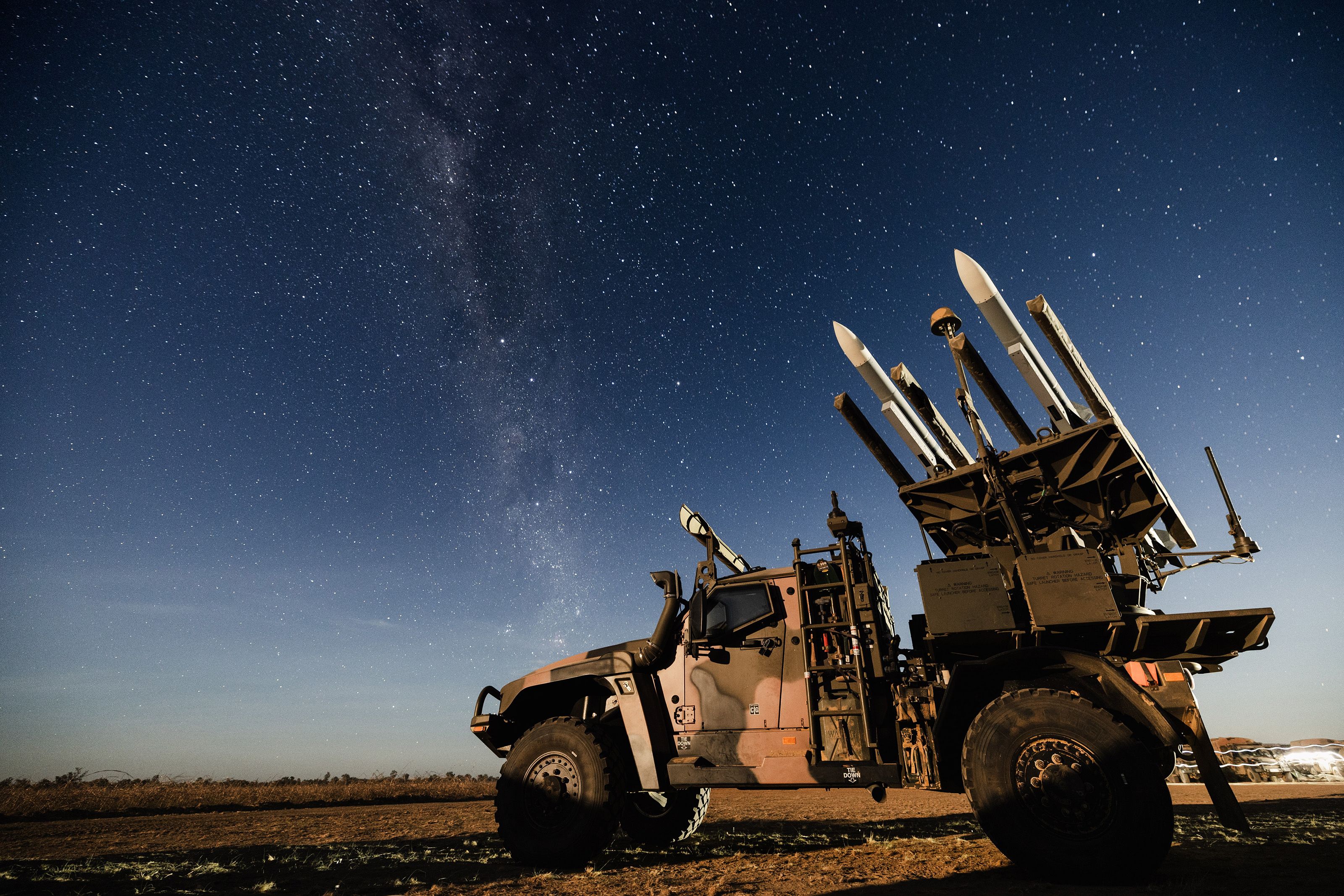 An Australian Army Hawkei High Mobility Launcher loaded with AIM120 AMRAAM training rounds during Exercise Talisman Sabre 2025