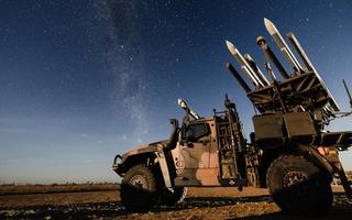 An Australian Army Hawkei High Mobility Launcher loaded with AIM120 AMRAAM training rounds during Exercise Talisman Sabre 2025