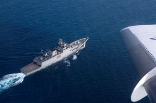 A maritime surveillance aircraft locates Indian Navy Ship INS Sahyad during Exercise Kakadu 2018
