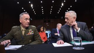 Chairman of the Joint Chiefs of Staff General Joseph Dunford (L) and Secretary of Defense James Mattis (R), ahead of testimony before the US Senate (April 2018)