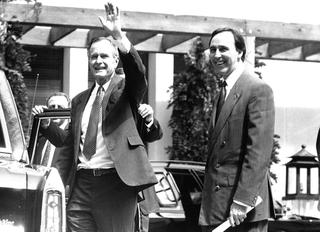 US President George HW Bush waves beside Australian Prime Minister Paul Keating in Sydney, 1992