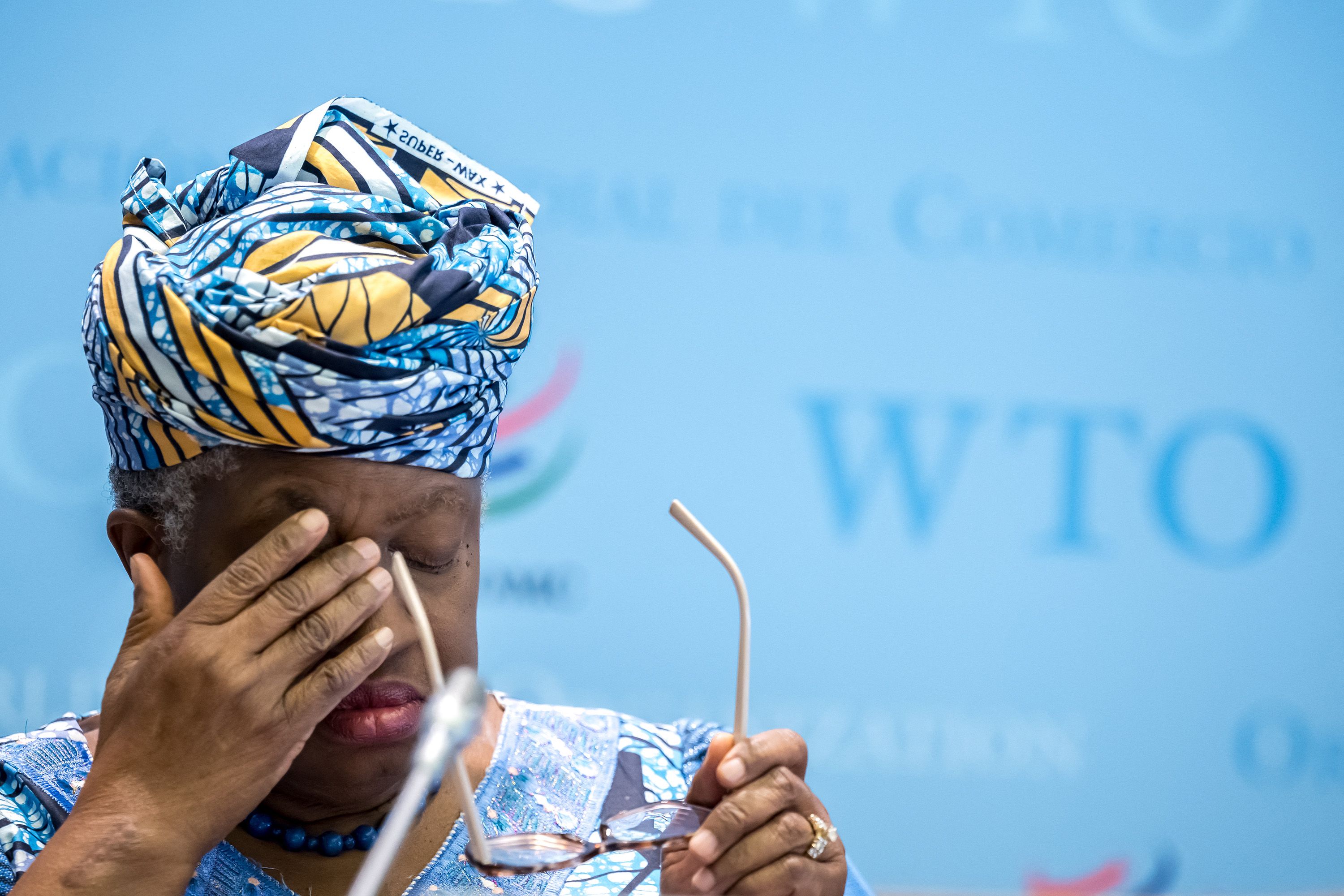 World Trade Organization Director-General Ngozi Okonjo-Iweala gestures during the launch of the global trade outlook at the WTO headquarters in Geneva on 19 March 2026