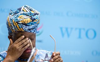 World Trade Organization Director-General Ngozi Okonjo-Iweala gestures during the launch of the global trade outlook at the WTO headquarters in Geneva on 19 March 2026