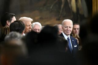 US President-elect Donald Trump (L) arrives to his inauguration ceremony as US President Joe Biden looks on