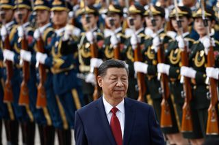 Chinese President Xi Jinping reviews the honour guard during the welcome ceremony for Bahrain's King Hamad bin Isa Al Khalifa at the Great Hall of the People on May 31, 2024 in Beijing, China. (Photo by Tingshu Wang - Pool/Getty Images)