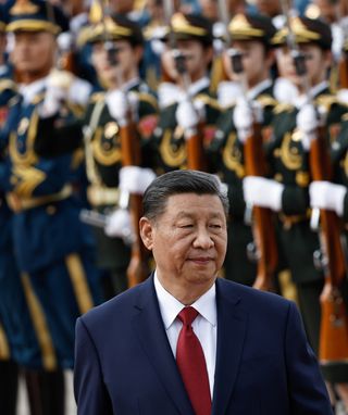 Chinese President Xi Jinping reviews the honour guard during the welcome ceremony for Bahrain's King Hamad bin Isa Al Khalifa at the Great Hall of the People on May 31, 2024 in Beijing, China. (Photo by Tingshu Wang - Pool/Getty Images)