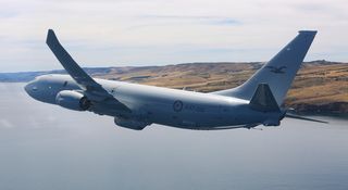 The Royal Australian Air Force’s first P-8A Poseidon flys down the St Vincent Gulf coastline near Adelaide in South Australia