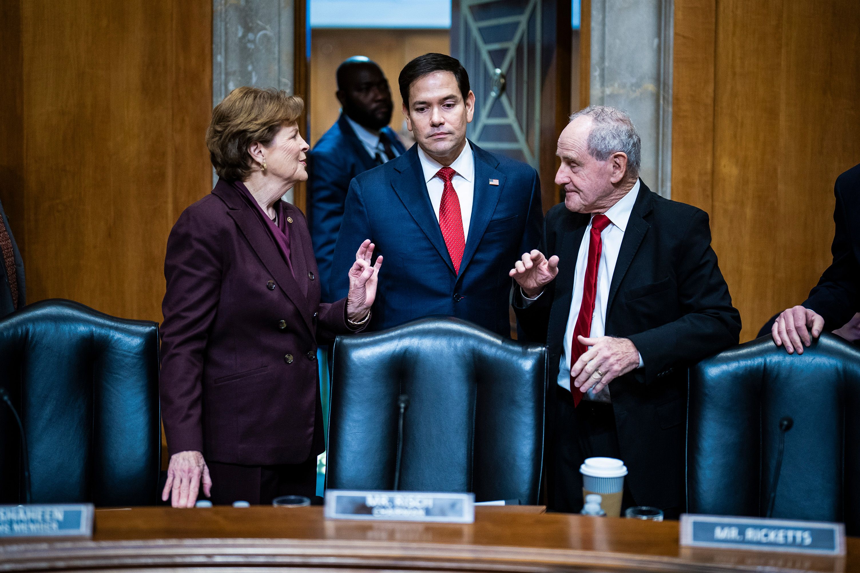 US President-elect Donald Trump’s nominee for Secretary of State, Senator Marco Rubio speaks with Foreign Relations Committee ranking member Senator Jeanne Shaheen and Chairman Senator James Risch