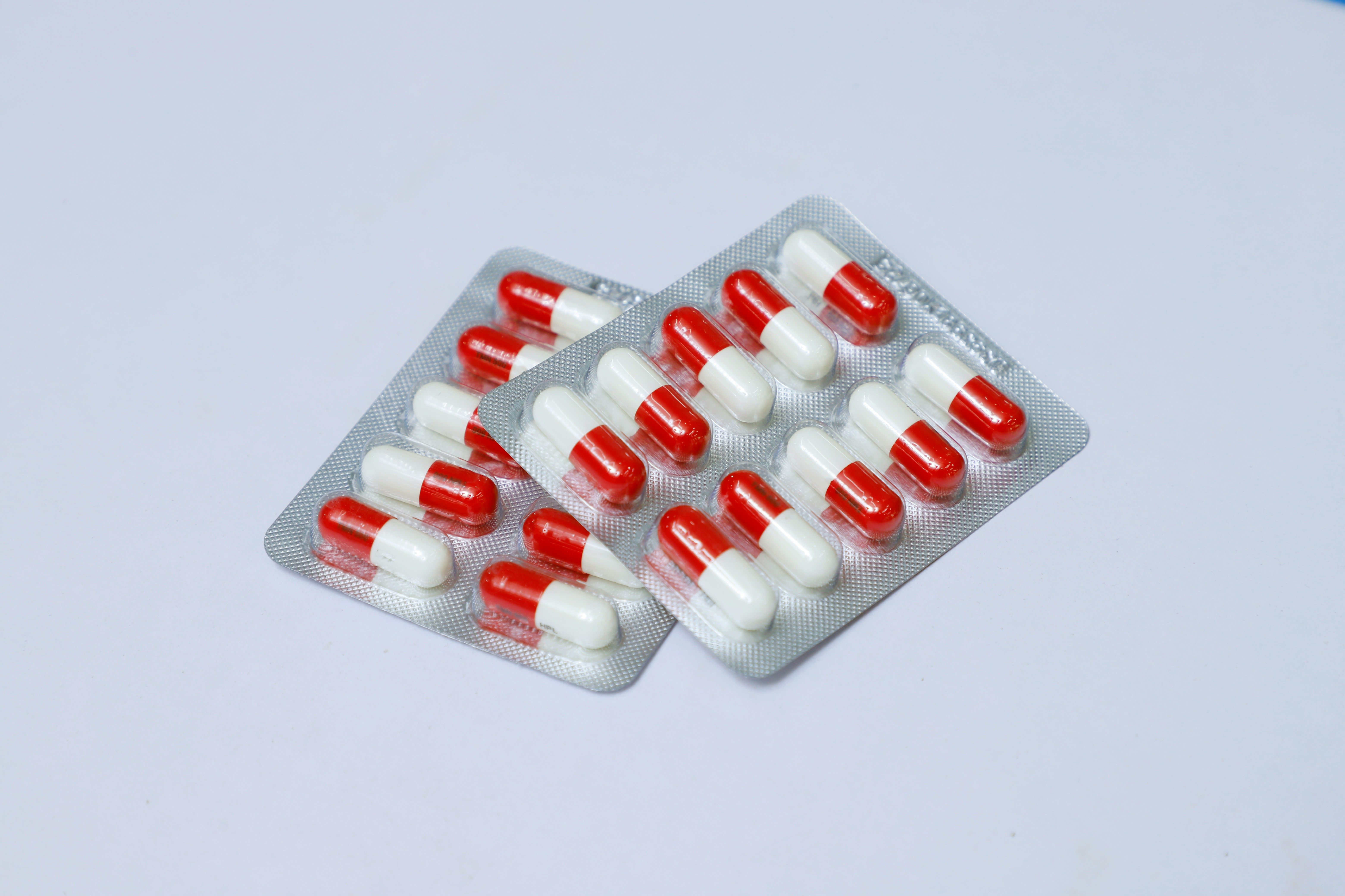 blister pack of red and white medicine
